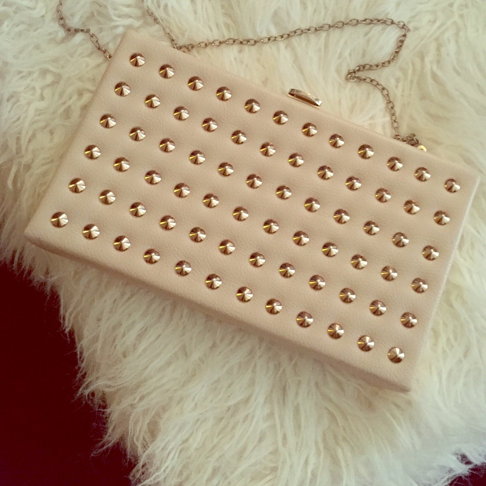Cream and gold clutch